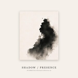 May include: A rectangular art print featuring a black ink wash painting on a cream background. The abstract ink forms a vertical, cloud-like shape. Below the image, the text reads SHADOW / PRESENCE and SUIBOKUGA Minimal Collection 02.