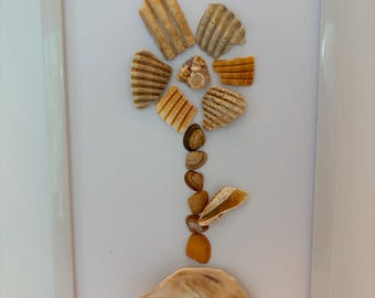 Delightful flower art crafted from natural shells off the shores of Fernandina Beach Florida.