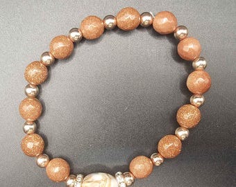 Handmade Goldstone Stretch Bracelet with Marbled Centerpiece Bead