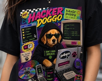 May include: A black t-shirt featuring a graphic of a golden retriever wearing a black hoodie and sunglasses, typing on a laptop. The design includes text like HACKER DOGGO, I DON'T BARK. I BREACH., and various retro computer-themed icons and stickers.