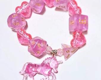 ONLY 1 - Mystic - Lilac Dice Stretch Bracelet with Pink Unicorn Charm and Glitter Hearts