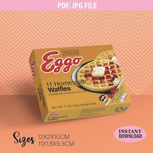 Puede incluir: Una caja rectangular de gofres Eggo 11 Homestyle. El envase es de color tostado con texto en rojo, mostrando una imagen de un gofre con mantequilla. El texto incluye Tastes as good as homemade y Kids Band Together for Safety. Medidas 12x2x10cm y 11x1.8x9.3cm.