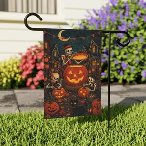 May include: A rectangular garden flag hanging on a black metal stand features a Halloween scene with three skeletons carving pumpkins. A black cat sits in the foreground among orange pumpkins, autumn leaves, and a dark house under a crescent moon.