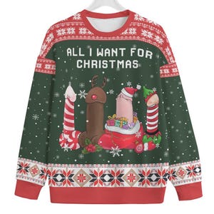 May include: A dark green long-sleeve sweatshirt with a red and white Nordic-style pattern at the collar and hem. The front features the text "ALL I WANT FOR CHRISTMAS" above a graphic of four phallic figures dressed in festive holiday attire.