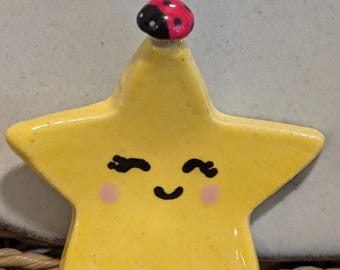 Spinner antiestrés con forma de estrella / Piedra antiestrés de cerámica