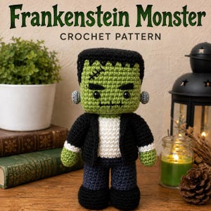 May include: A crochet Frankenstein Monster doll featuring a green head with black hair, a stitched forehead, and black eyes. The doll wears a black jacket over a white shirt, dark pants, and grey bolts on the sides of the head. Text reads Frankenstein Monster CROCHET PATTERN.