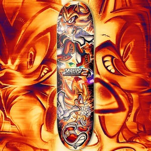 May include: A skateboard deck featuring a graphic of the video game character Shadow the Hedgehog in a dynamic pose. The background is a fiery orange and yellow with a blurred image of Shadow's face.