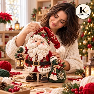 May include: A crocheted Santa Claus doll featuring a red hat with gold embroidery, a white beard, a dark brown belt with a gold buckle, and dark brown boots. The doll holds a small lantern and stands next to a green gift bag with a snowflake design.