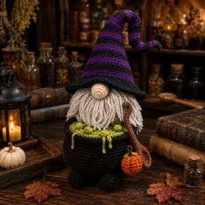 May include: A crocheted gnome wearing a tall, purple and black striped pointed hat, featuring a long white yarn beard, a beige nose, and a black cauldron filled with green textured bubbles, holding a brown spoon and a small orange pumpkin.