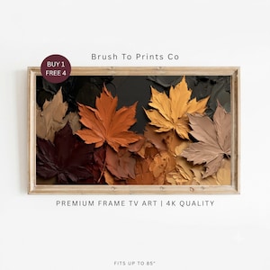 May include: A rectangular framed digital artwork for a television featuring a textured oil painting of autumn maple leaves in shades of brown, orange, and yellow. Text includes Brush To Prints Co, BUY 1 FREE 4, PREMIUM FRAME TV ART | 4K QUALITY, FITS UP TO 85".