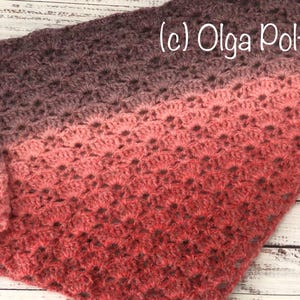 May include: A crocheted shawl with a gradient of colors from dark purple to pink. The shawl is made with a delicate open stitch pattern. The text (c) Olga Poltava is visible in the upper right corner of the image.