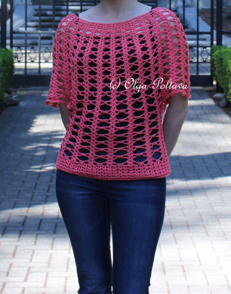 May include: A coral-colored, open-weave crochet top with short sleeves. The top has a wide neckline and a textured, lattice-like pattern. The text "(c) Olga Poltava" is visible on the top.