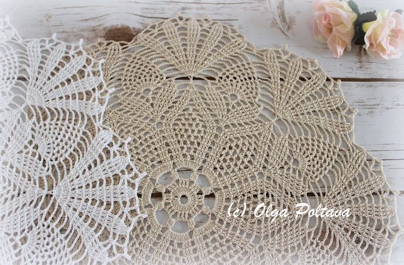 May include: Two crocheted doilies, one white and one beige, with intricate patterns. The beige doily has the text "(c) Olga Poltava" in the center.