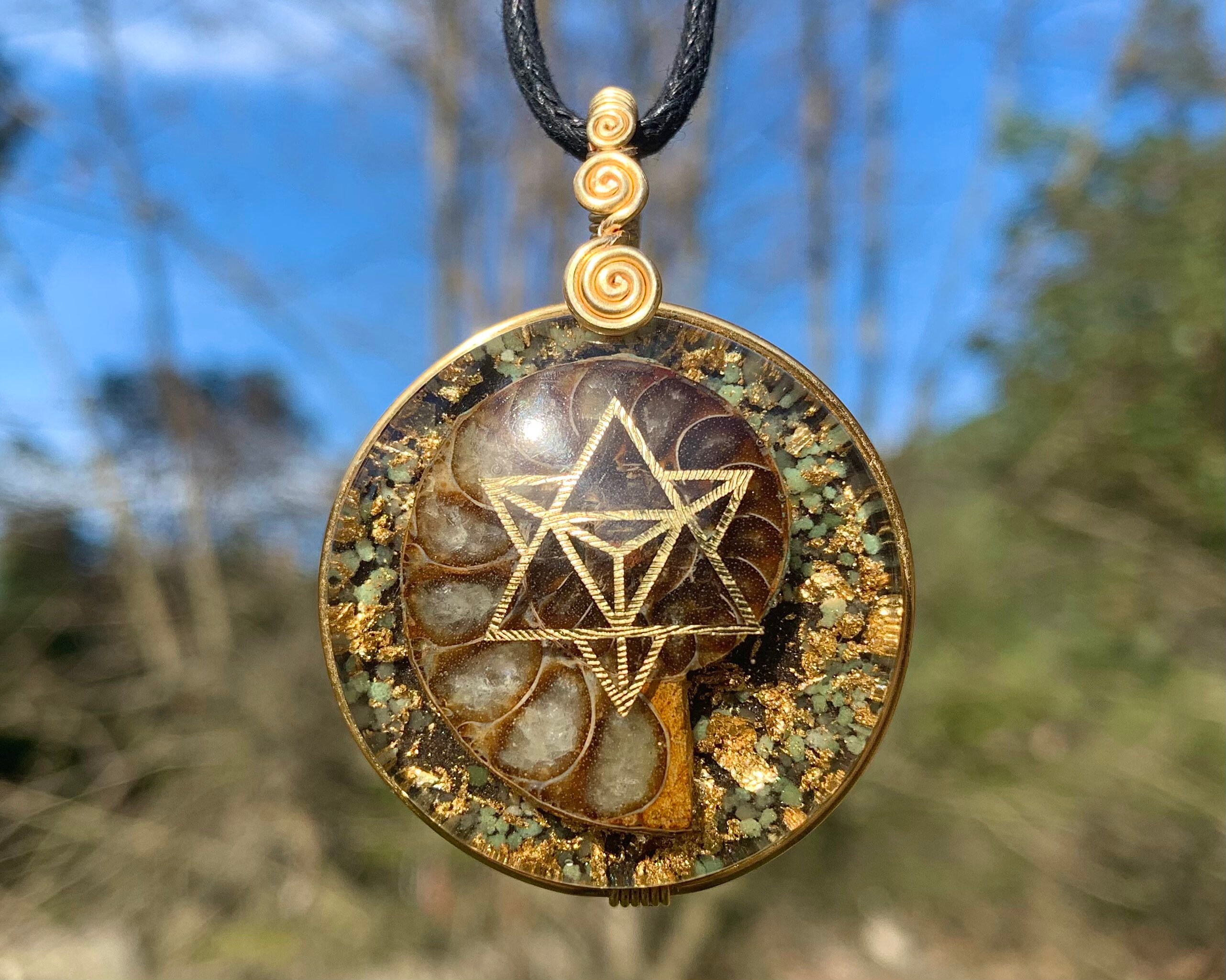 collaboration with Sacred State Design Orgone Pendant Ammonite with 22k Star Tetrahedron Merkaba