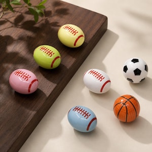 Tiradores para armarios con forma de balón deportivo, tiradores para cajones con forma de balón de fútbol, balones de baloncesto, tiradores para cómodas de habitaciones infantiles, tiradores para armarios de guardería, tiradores de cerámica para armarios