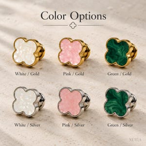 May include: Six clover-shaped knobs labeled Color Options. Top row: white, pink, and green inserts with gold rims. Bottom row: white, pink, and green inserts with silver rims. Each knob features a marbled texture and a central clover icon above.