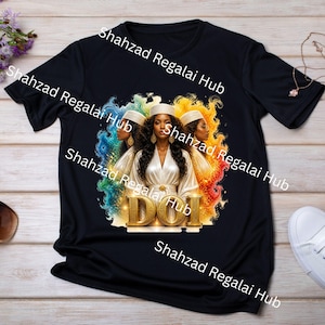 May include: A black t-shirt featuring a graphic print of three individuals wearing white headpieces and white robes. The design includes colorful smoke-like swirls in blue, green, yellow, and red, with the gold text DOI centered at the bottom.