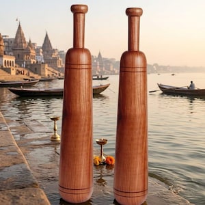 Traditional Indian fitness equipment, specifically a Mugdar For Mahogany wood