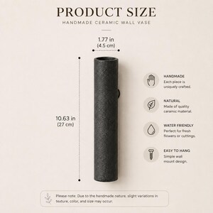 May include: A cylindrical black ceramic wall vase with a textured finish. The vase measures 10.63 inches in height and 1.77 inches in diameter. Text on the image includes PRODUCT SIZE, HANDMADE CERAMIC WALL VASE, HANDMADE, NATURAL, WATER FRIENDLY, and EASY TO HANG.
