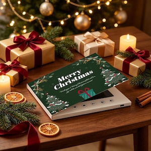 May include: A white video greeting card with a dark green cover featuring the text Merry Christmas, illustrations of pine trees, and a gift box. The card is open, revealing a white base with circular control buttons on the front edge.