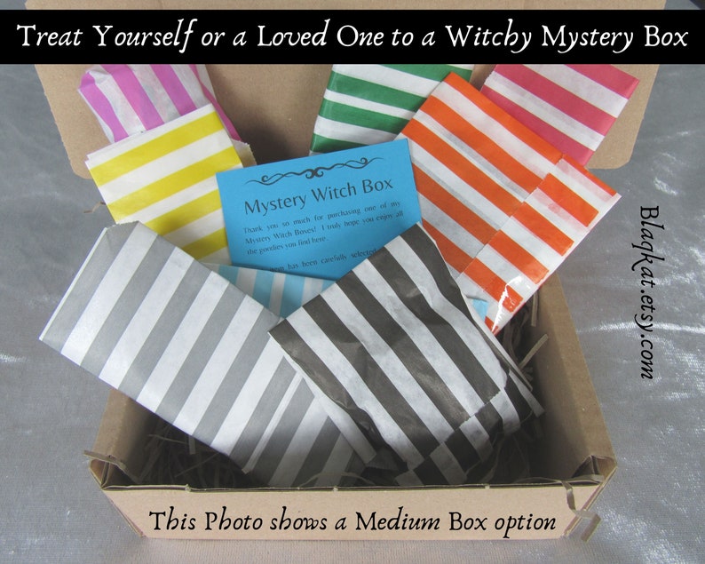 Treat yourself or a loved one to a Witchy Mystery Box. Photo of a Medium Box with 8 items all individually wrapped in stripey paper bags