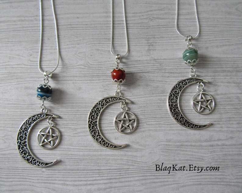 Image of 3 necklaces each featuring a different gemstone bead - blue agate, red jasper and green agate are featured here