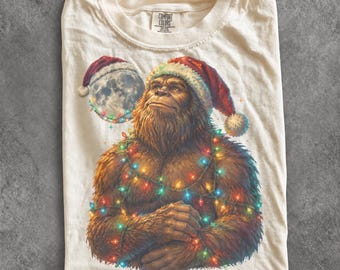 Vintage Christmas Bigfoot 90s Graphic Tee, Retro Holiday Comfort Colors® Cryptid Lover Festive Shirt