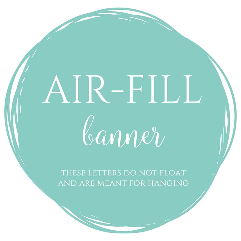 May include: A teal blue circle with a white outline and the text "AIR-FILL banner THESE LETTERS DO NOT FLOAT AND ARE MEANT FOR HANGING" in white.