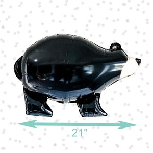 May include: Black balloon bear with white accents, standing on a white background with gray polka dots. The bear is 21 inches tall.
