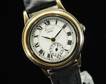 US Duty Paid Vintage 1989 N MINT Seiko Avenue 2K22-0090 Gold Roman Small Seconds Quartz Womens Watch JAPAN