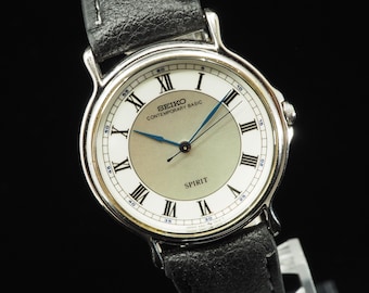US Duty Paid Vintage 1989 N MINT Seiko Spirit 5S21-7000 Roman Sweep Second Quartz 34mm Mens Watch JAPAN