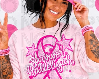 May include: A light pink sweatshirt featuring a large magenta breast cancer awareness ribbon graphic, two stars, and the text "Survivor hallelujah" in a cursive font. A matching pink and white trucker hat displays the text "CANCER SUCKS".