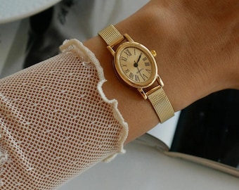 Goldene ovale Damenuhr mit römischen Ziffern und Mesh-Armband – elegante, klassische Quarzuhr