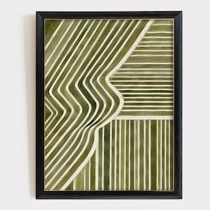 May include: A framed wall art print featuring an abstract pattern of olive green and white stripes. The design is divided into three sections with diagonal, horizontal, and vertical lines, all enclosed within a thin black rectangular frame.