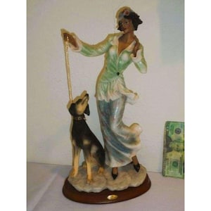 Armani Statues Lady and Dog - Etsy