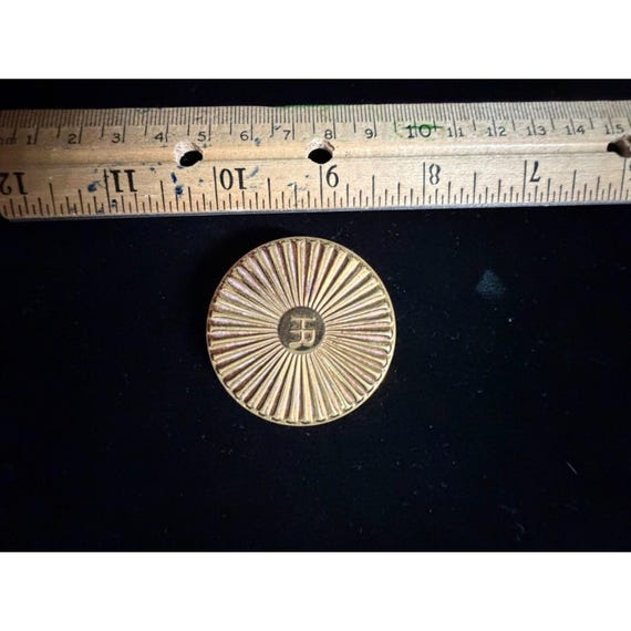 vtg. Helena Rubinstein gold tone compact with sunburst design