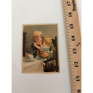 Vintage royal java coffee trade depicting a man and child