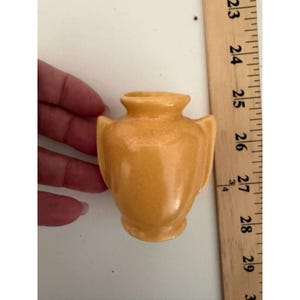 vtg. miniature yellow glazed art deco double handled pottery vase