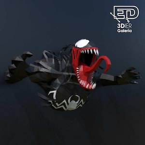 Puede incluir: Una escultura de pared 3D low-poly del personaje Venom, con cuerpo negro, parches oculares blancos y un emblema de araña blanco en el pecho. La figura tiene la boca abierta con dientes blancos afilados y una larga lengua roja. Texto 3DIER Galería.