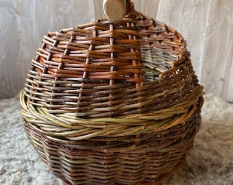 Handmade willow basket with natural wood handle