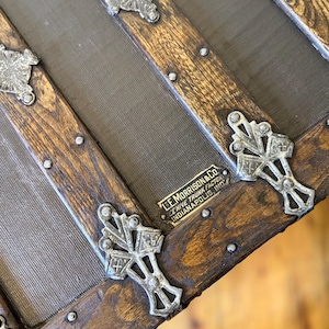 ornate antique trunk hardware detail