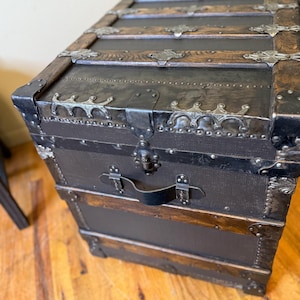 antique trunk with leather handles