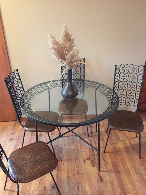 wrought iron dining room table and chairs