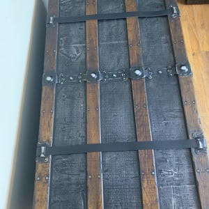 Extra large flat top storage chest used as an oversized rustic coffee table