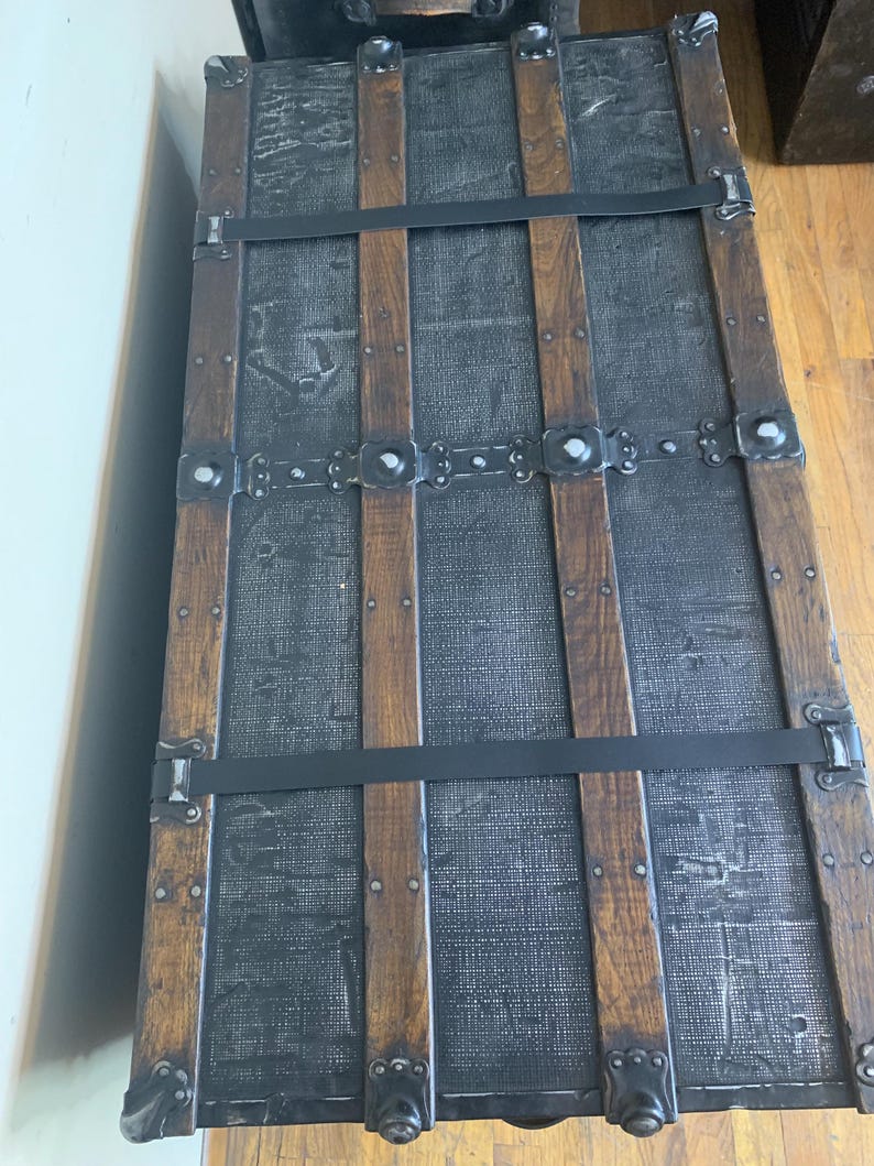 Extra large flat top storage chest used as an oversized rustic coffee table