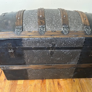 Authentic 19th century travel luggage curated for high-end home interiors.