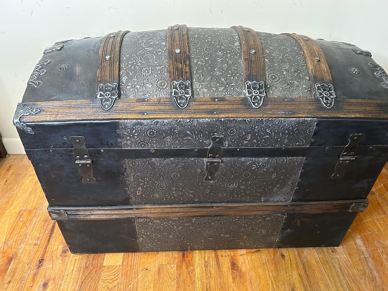 Authentic 19th century travel luggage curated for high-end home interiors.
