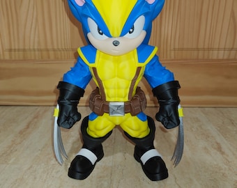 May include: A stylized figurine featuring a character with blue fur, a yellow mask, and a yellow and blue suit. The figure has black gloves with silver claws, a brown utility belt with a silver buckle, and black boots with white accents.