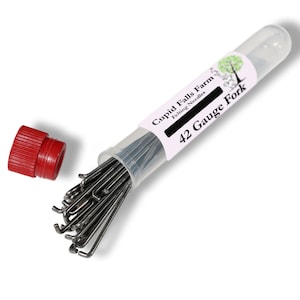 42 Gauge Forked rooting needles great for rooting hair on newborn dolls. Choose  from 1, 5, 10, 25 or 50 needle packs.