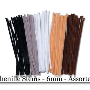 May include: Assorted 6mm chenille stems in black, gray, white, peach, and brown. These craft supplies are ideal for various DIY projects, including pipe cleaner crafts and art projects. The image shows a bundle of colorful, flexible stems.